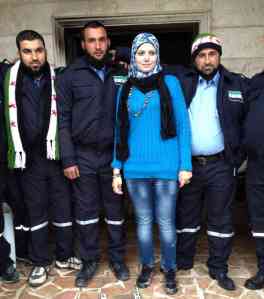 Razan Shalab Al-Sham with civil police in Khirbet al-Joz, Syria - NPR photo