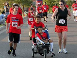 Titus and Tobias Bass running a 5k race in Oklahoma
