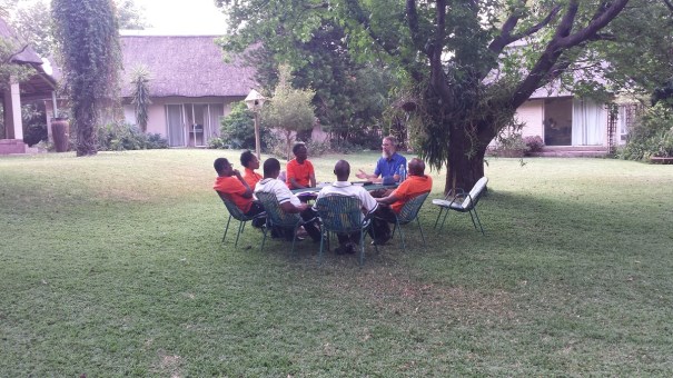 Lee Woofenden teaching a class attended by seminarians and a fellow faculty member